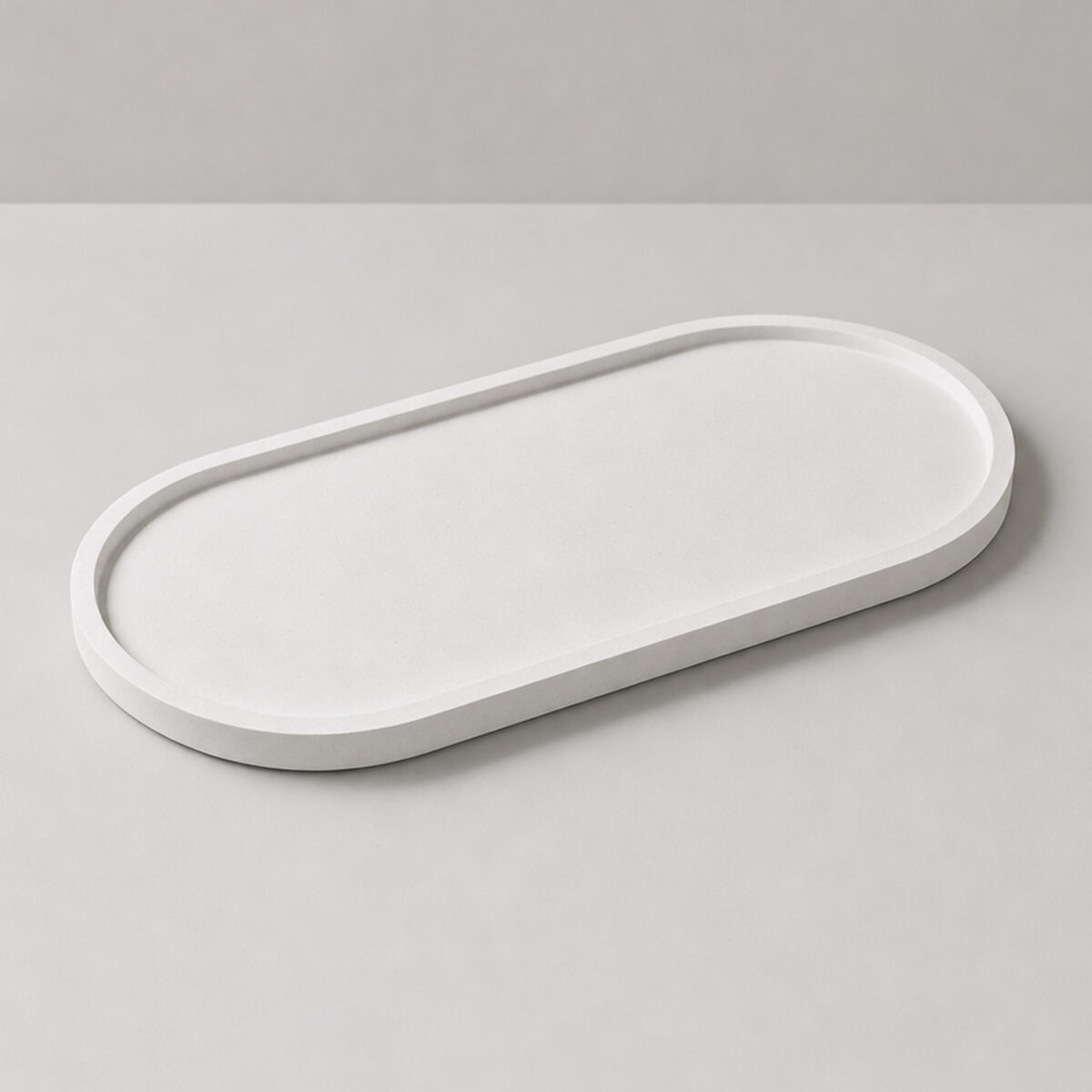Bandeja Decorativa Oval 24cm em Cimento Artesanal Bandeja Decorativa Oval 24cm em Cimento Artesanal, vista em perspectiva