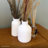 Foto real de cliente: Vaso Decorativo de Cimento com Flor Seca — Conjunto 2 Peças