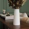 D_759945-MLB93430897786_092025-O.jpg Arranjo de Flores Secas em Vaso de Cimento com Listras